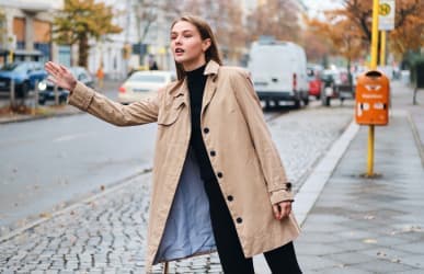 woman watiing for taxi servcie to dia airport in Steamboat, CO 